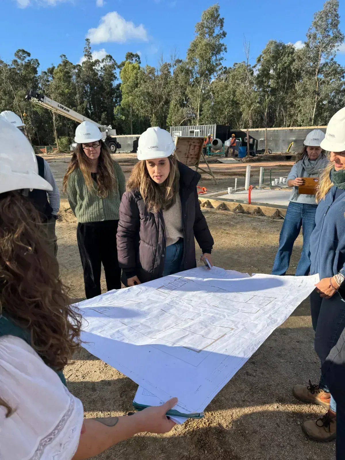 Team studying construction plans